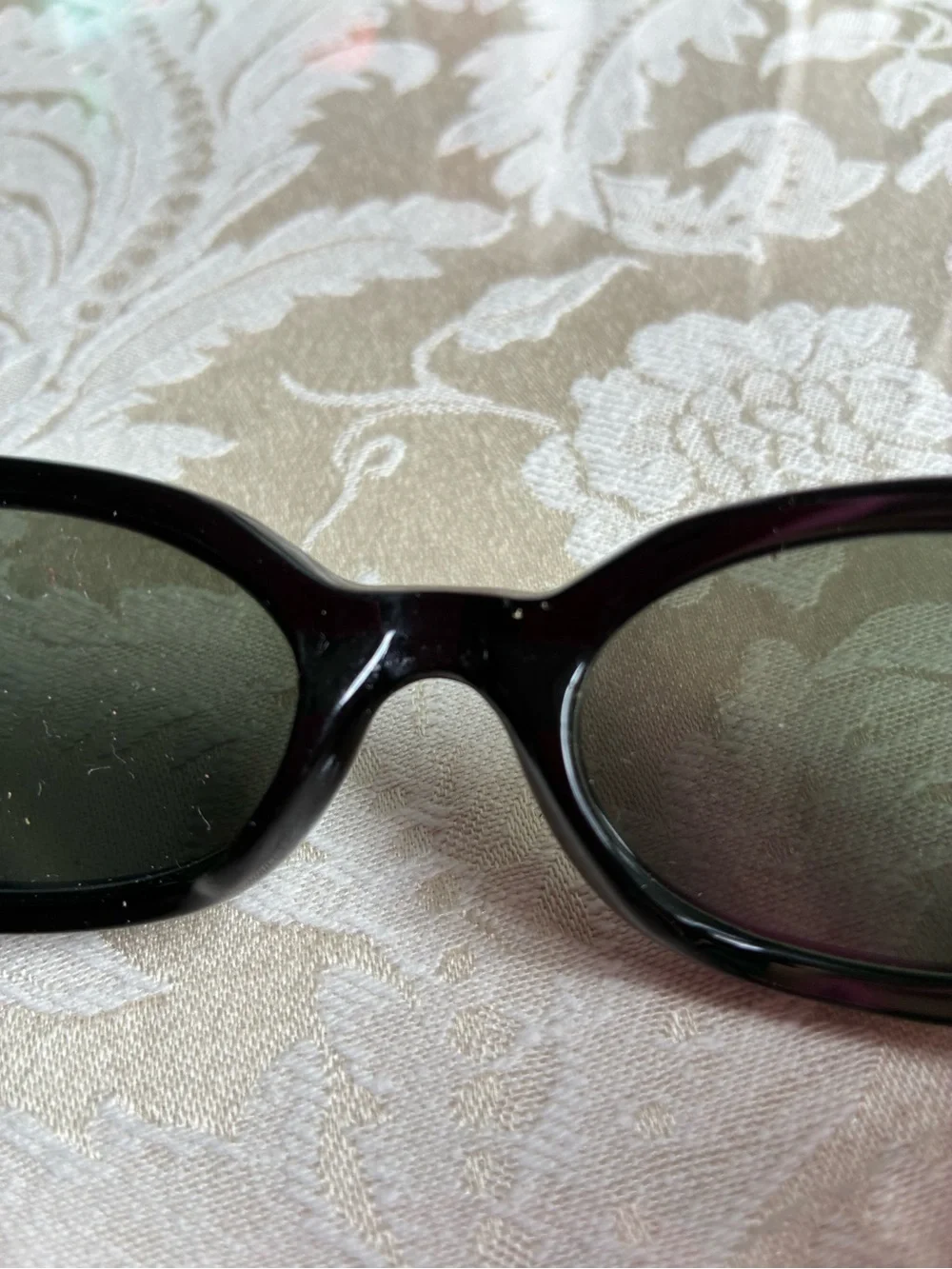 The Limited Black Oval Sunglasses with Tortoiseshell Temples